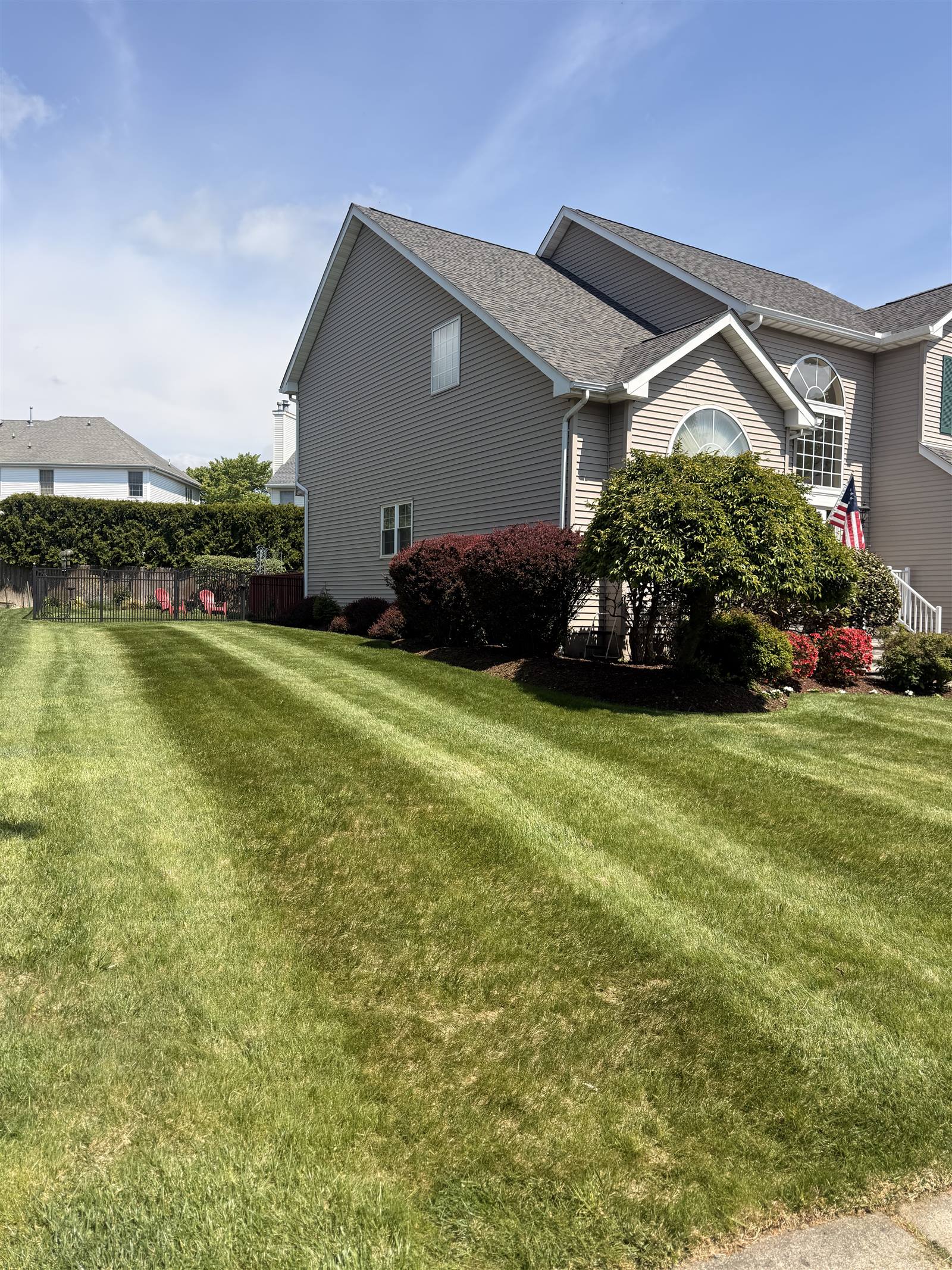 Striped lawn in front of home